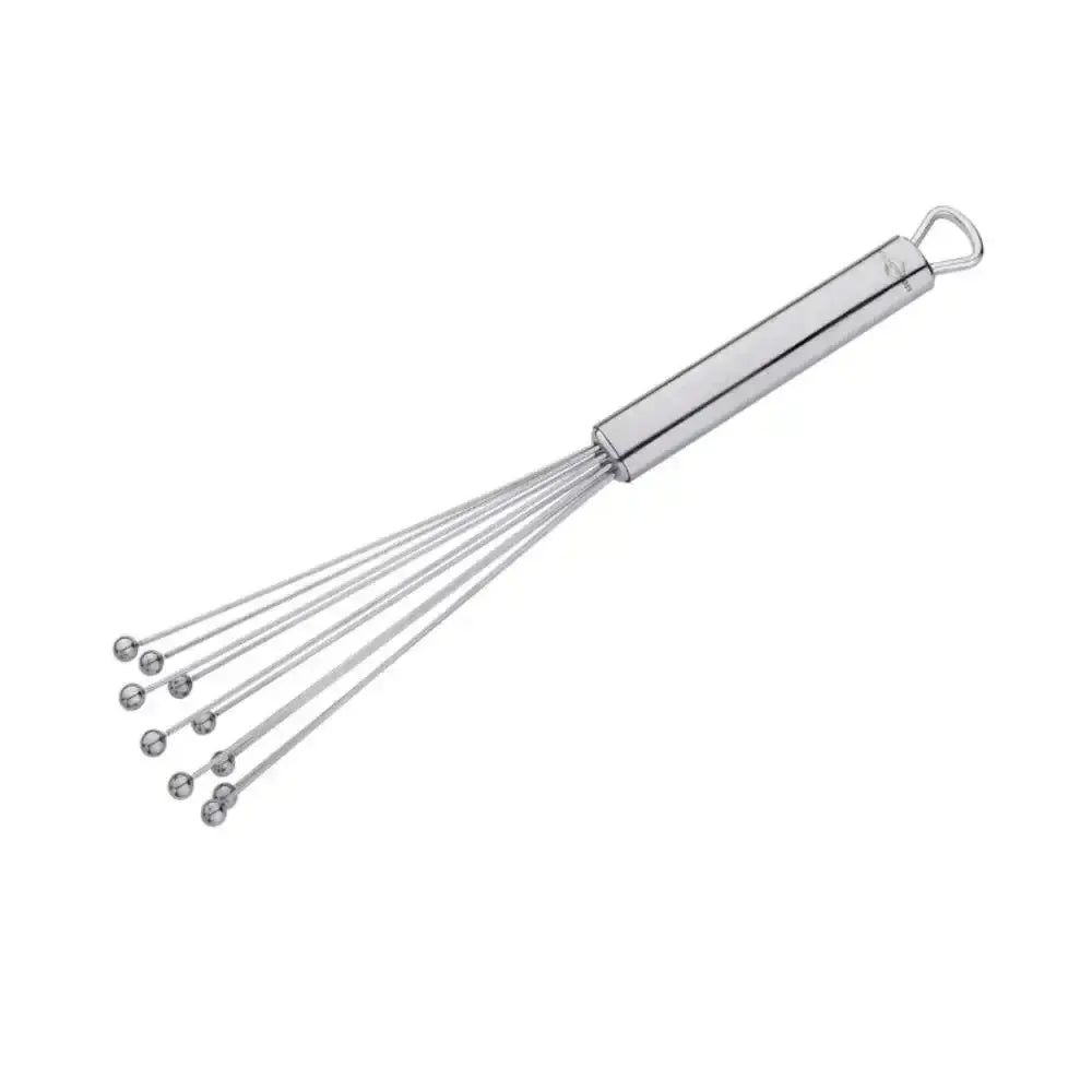 Metal whisk on a white background