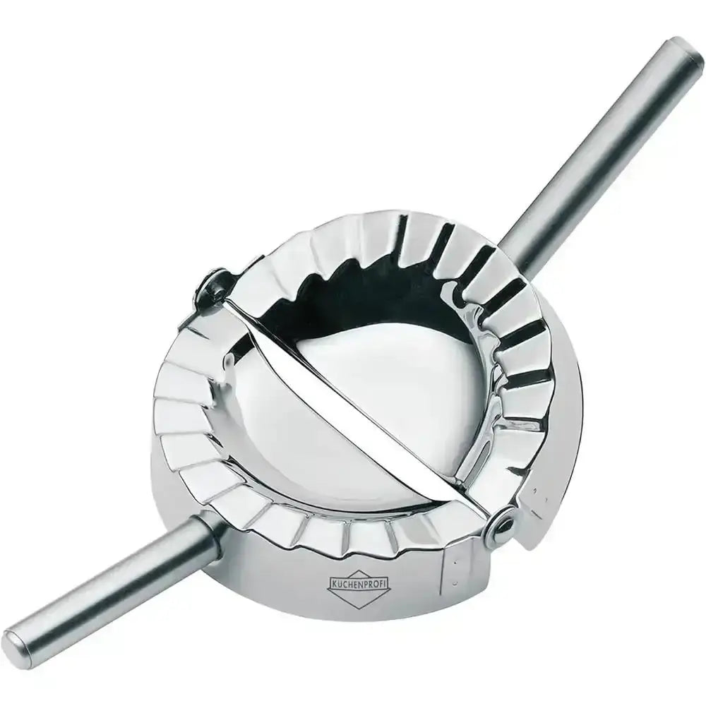 Metallic ravioli maker on a white background