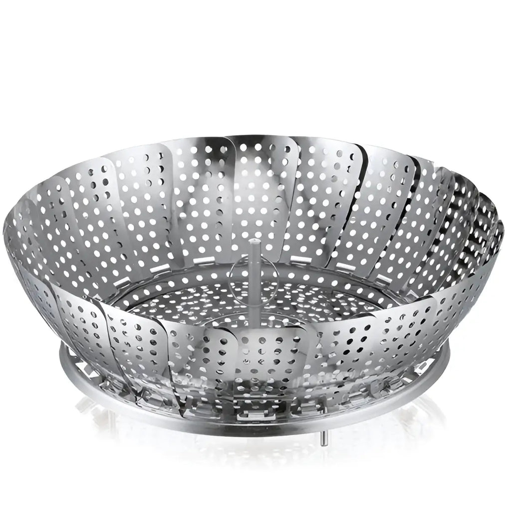 Metal steamer basket with perforated design on a white background