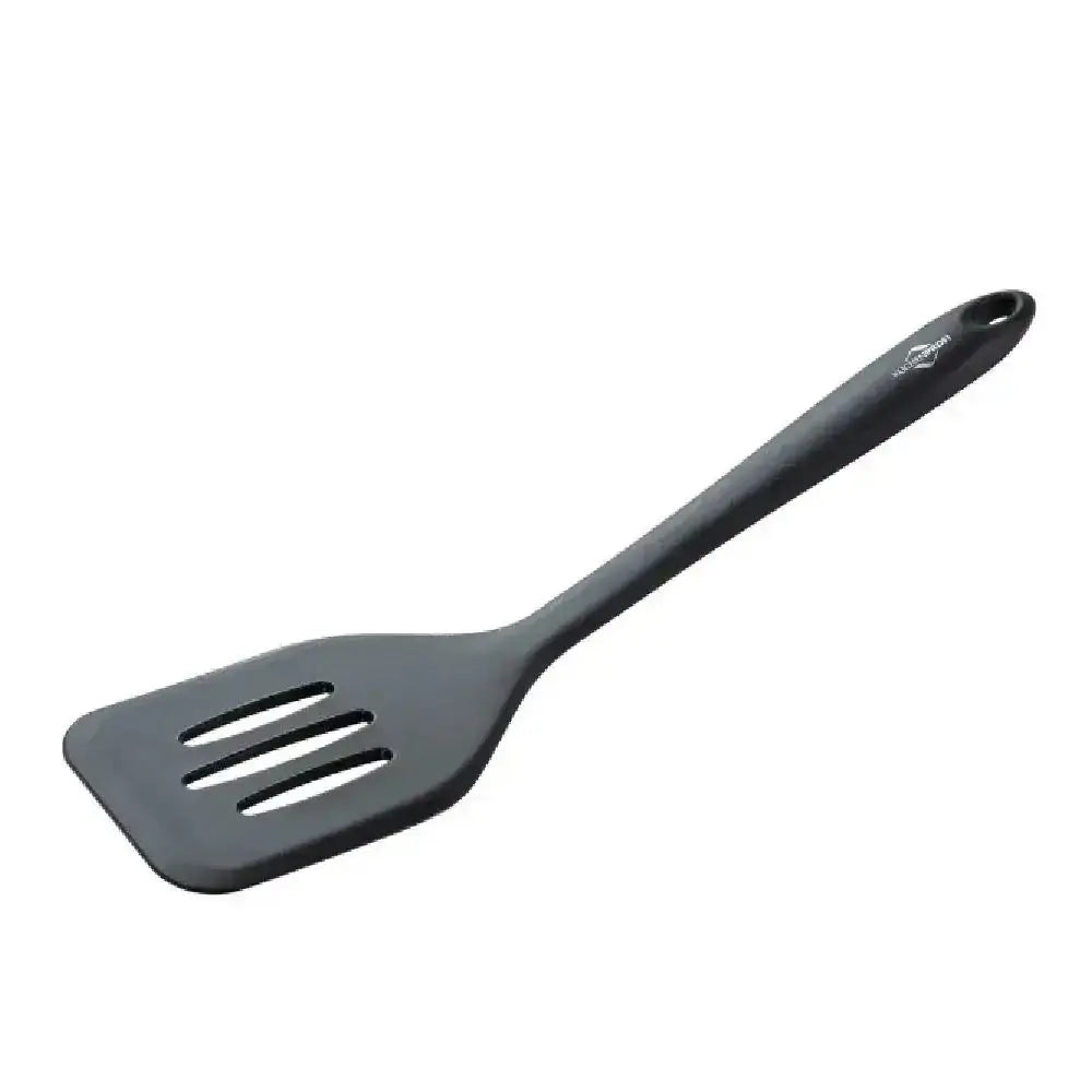 Black slotted spatula on a white background