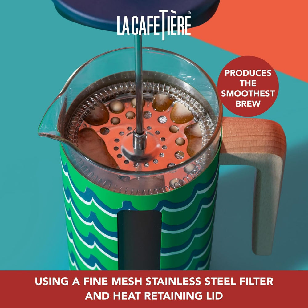 La Cafétière coffee maker with a colorful design on a blue and orange background.