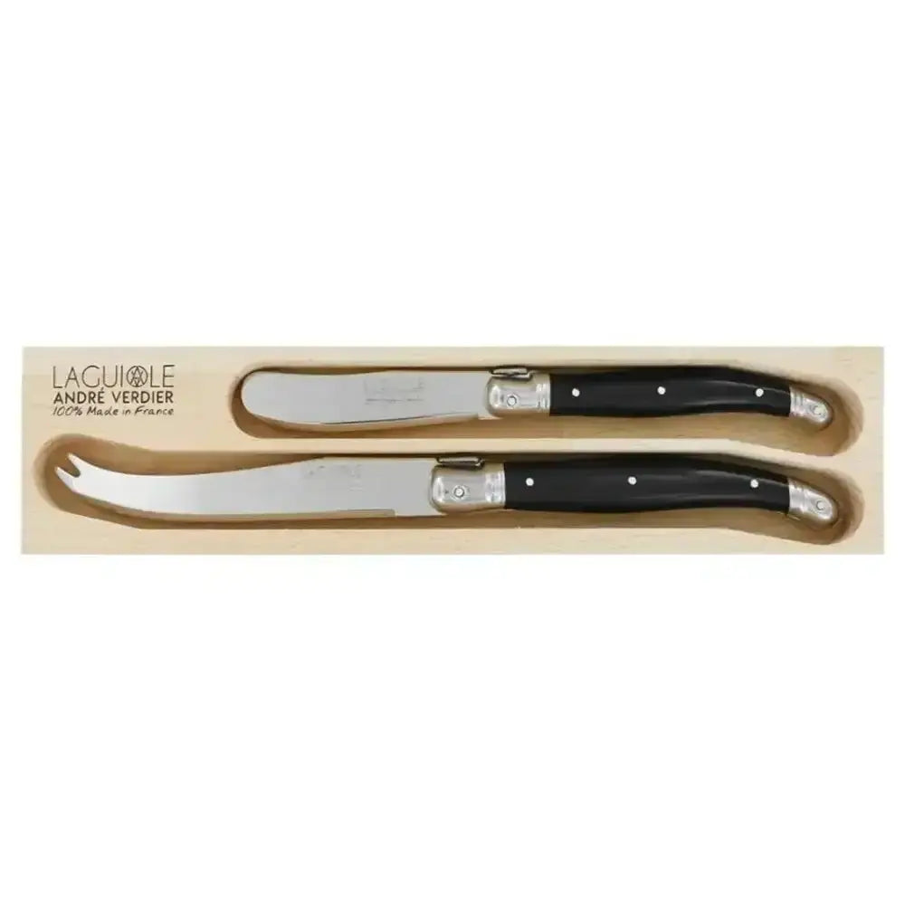 Two Laguiole knives with black handles in a wooden box on a white background
