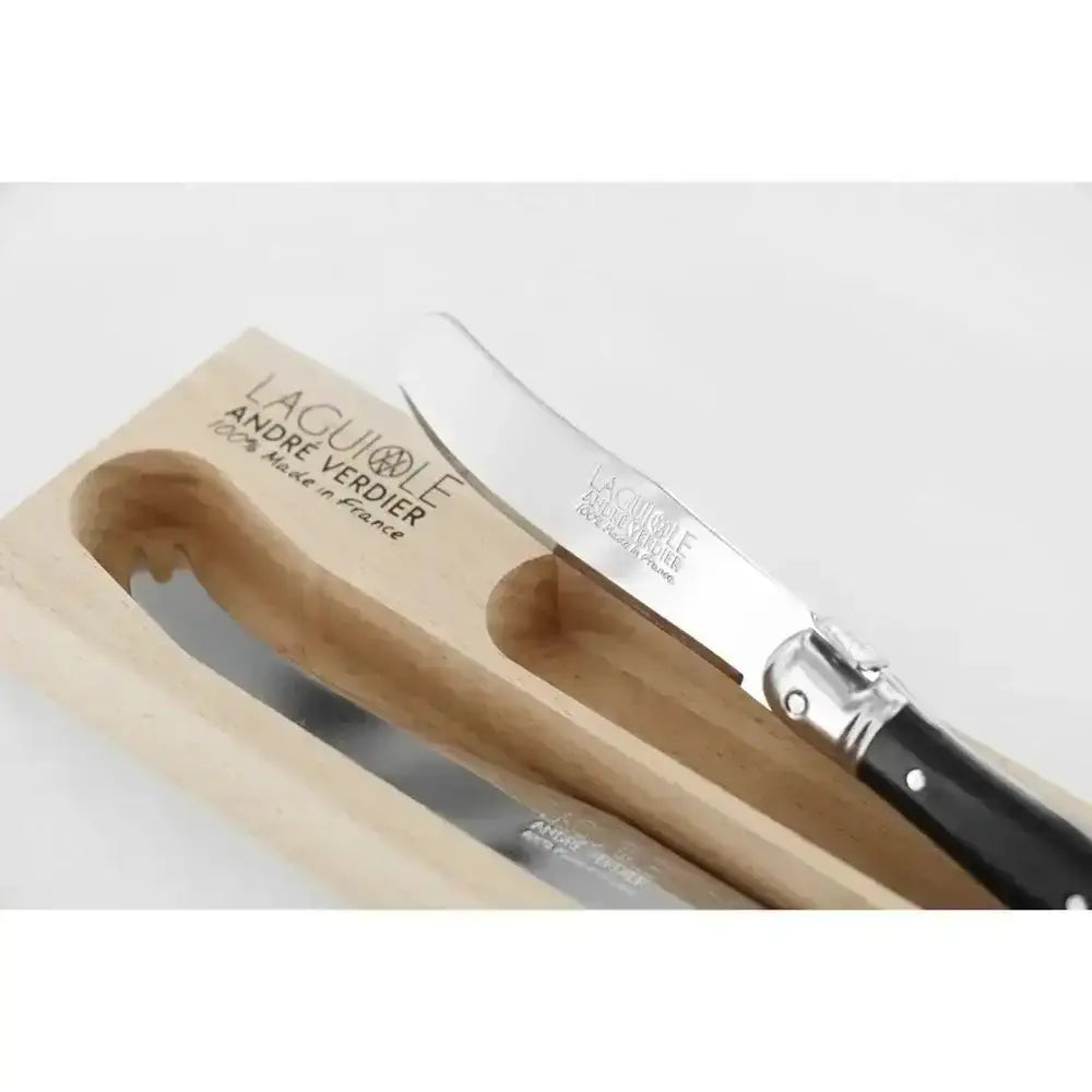 Knife with wooden handle and visible brand name on a light gray background