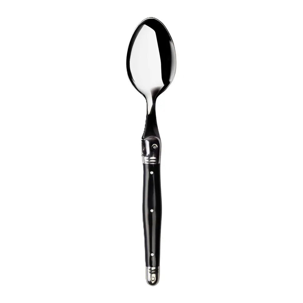 Spoon with black handle on a white background