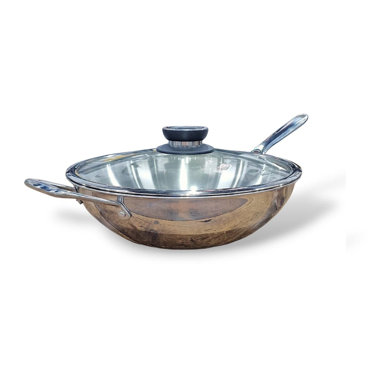 Stainless steel wok with lid on a white background
