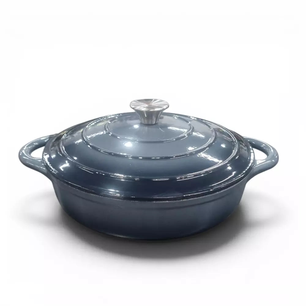 Ombre grey cast iron shallow casserole pot on white background