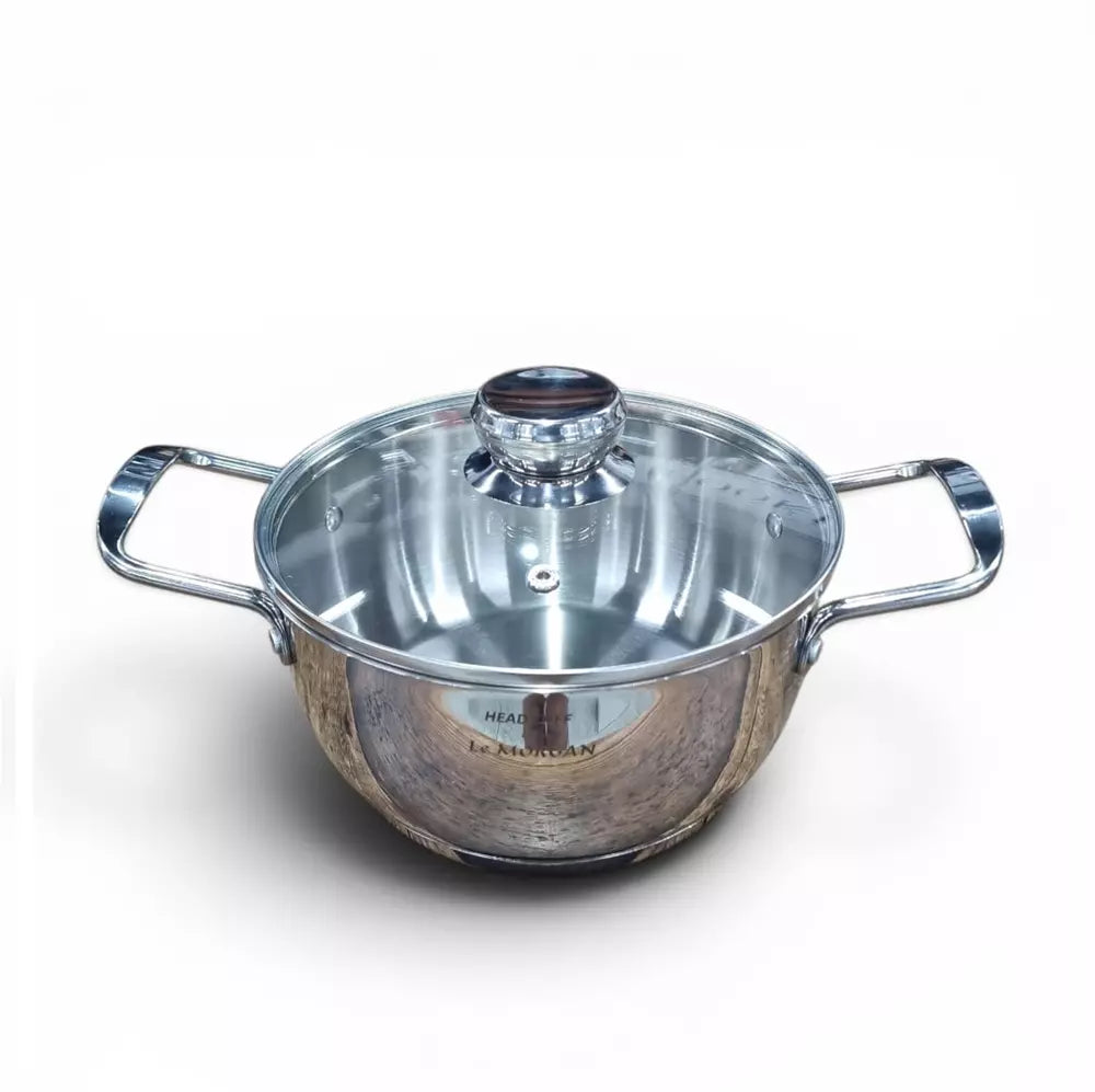 Stainless steel pot with glass lid on a white background