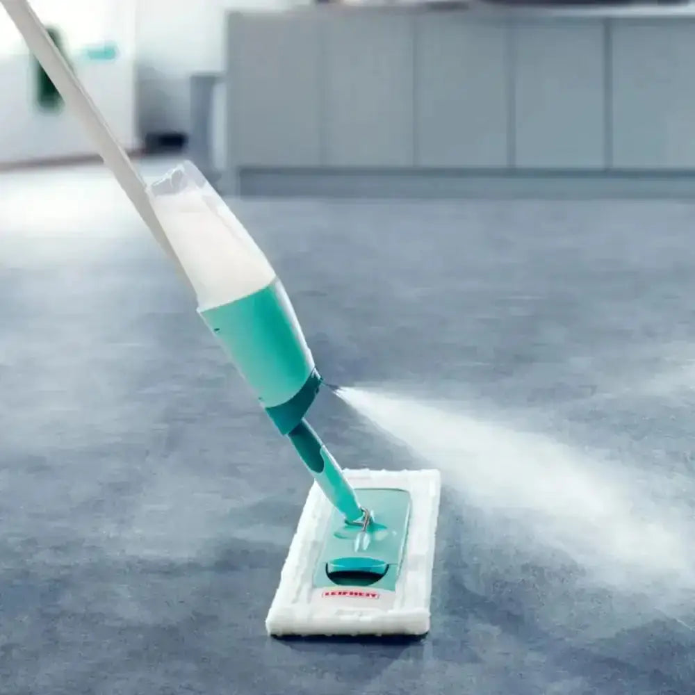 Mop cleaning a floor with a blurred background
