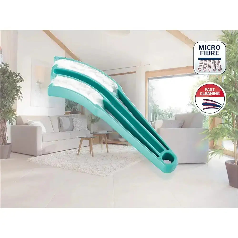 Turquoise microfiber cleaning tool with 'Microfiber' and 'Fast Cleaning' badges in a living room setting.