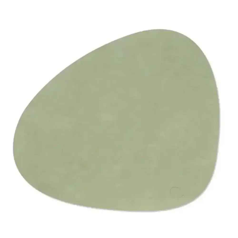 Green leather mat on a white background