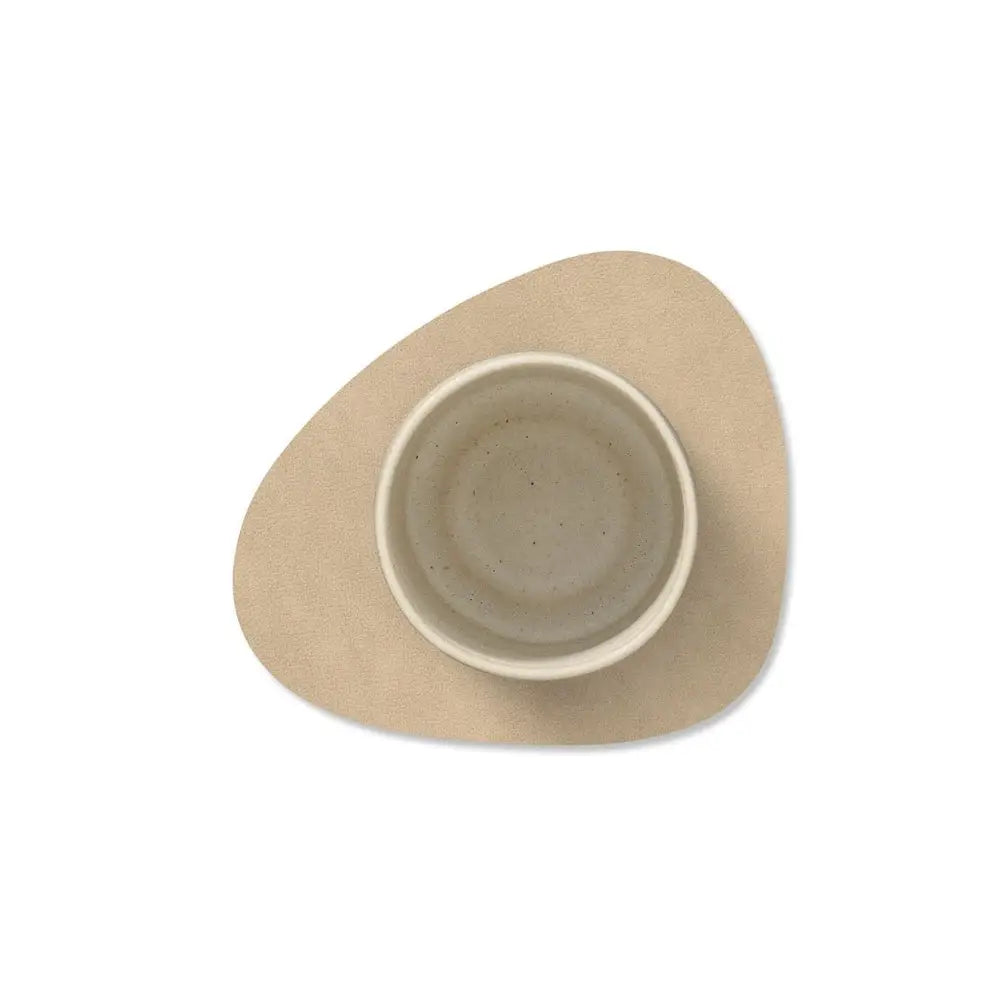 Beige ceramic bowl on a white background