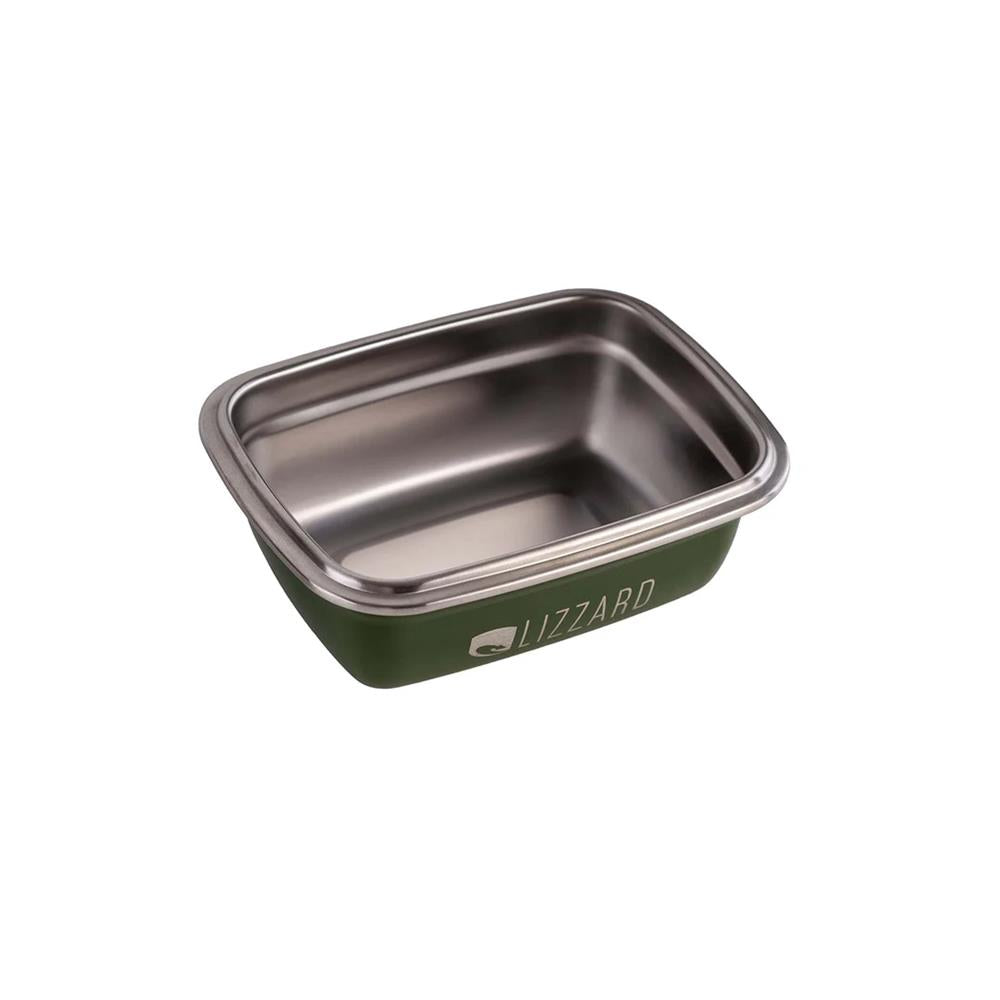 Green food container with metal lid on a white background