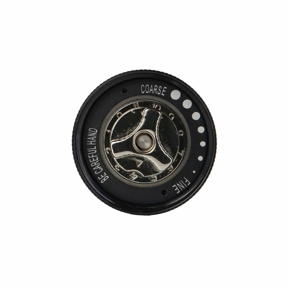 Black and silver adjustment wheel with 'Coarse' and 'Fine' labels on a white background