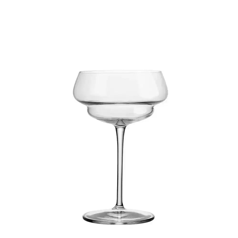 Clear glass cocktail glass on a white background
