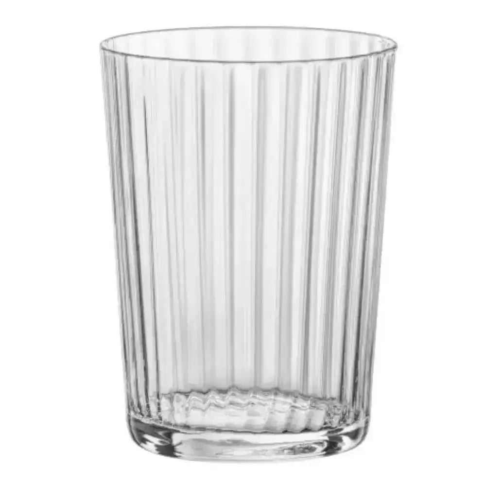 Clear glass tumbler with vertical ribbing on a white background
