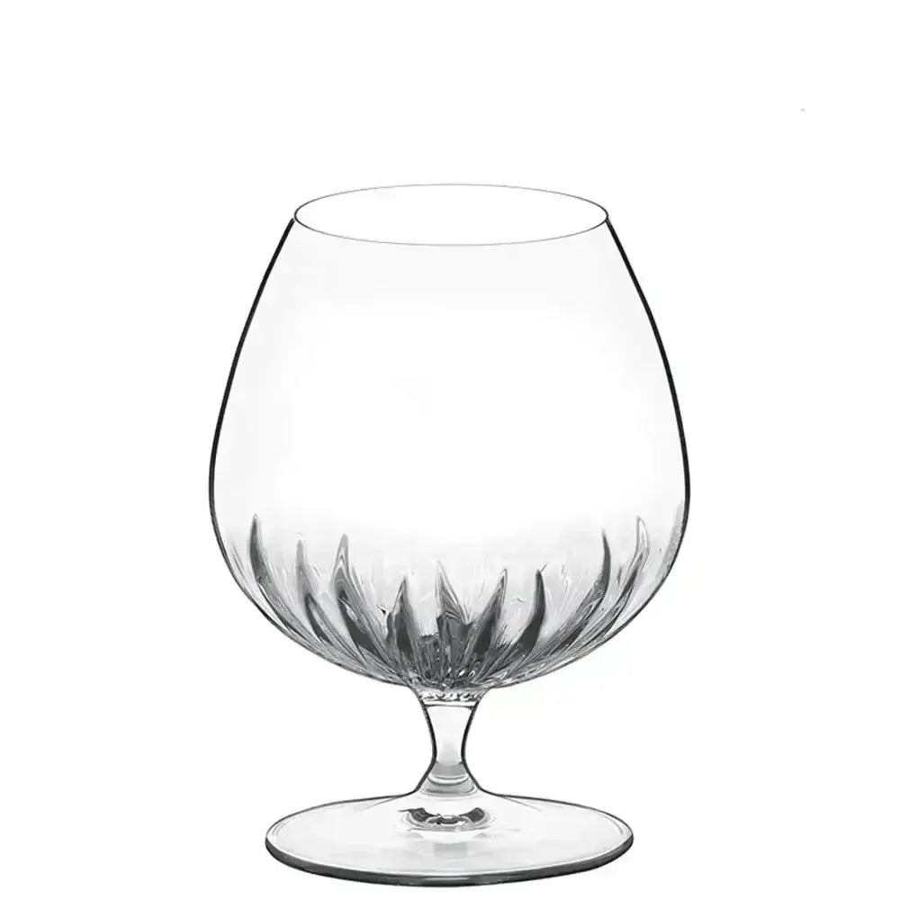Clear glass snifter on a white background
