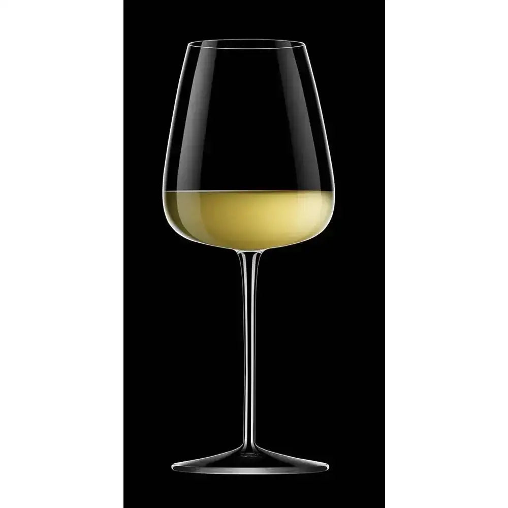 Wine glass with white wine on a black background