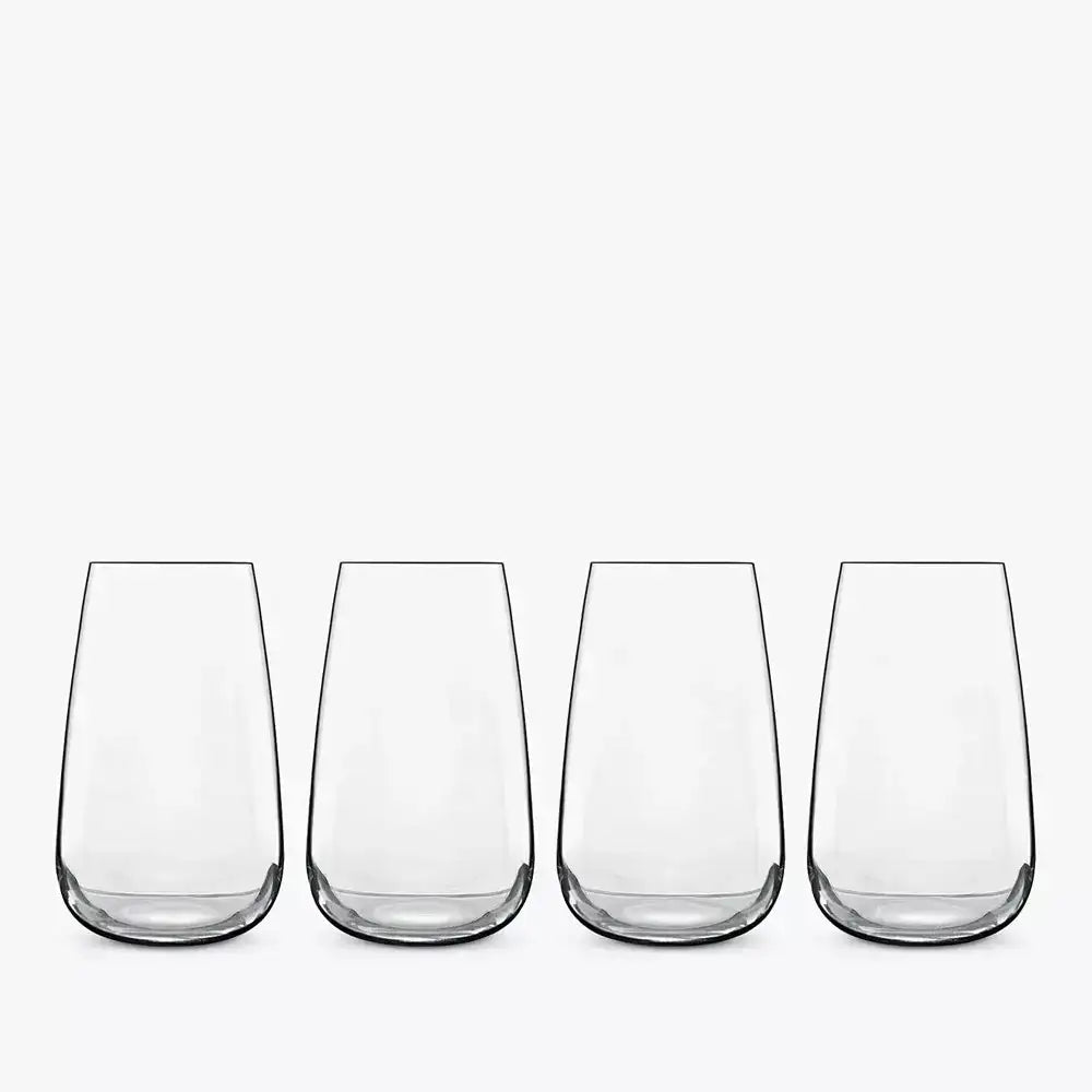 Four clear glass tumblers on a white background