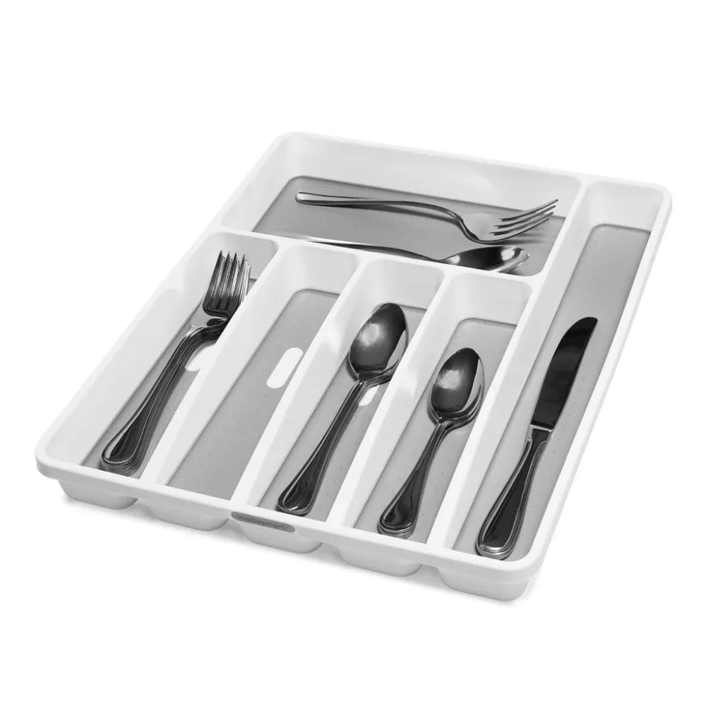 White cutlery organizer with silverware including forks, spoons, and knives on a white background
