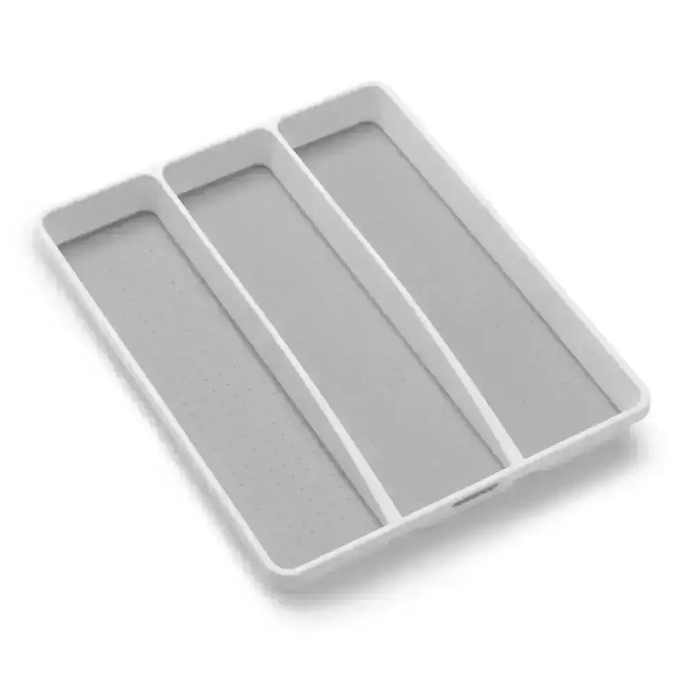 Gray plastic drawer organizer with three compartments on a white background