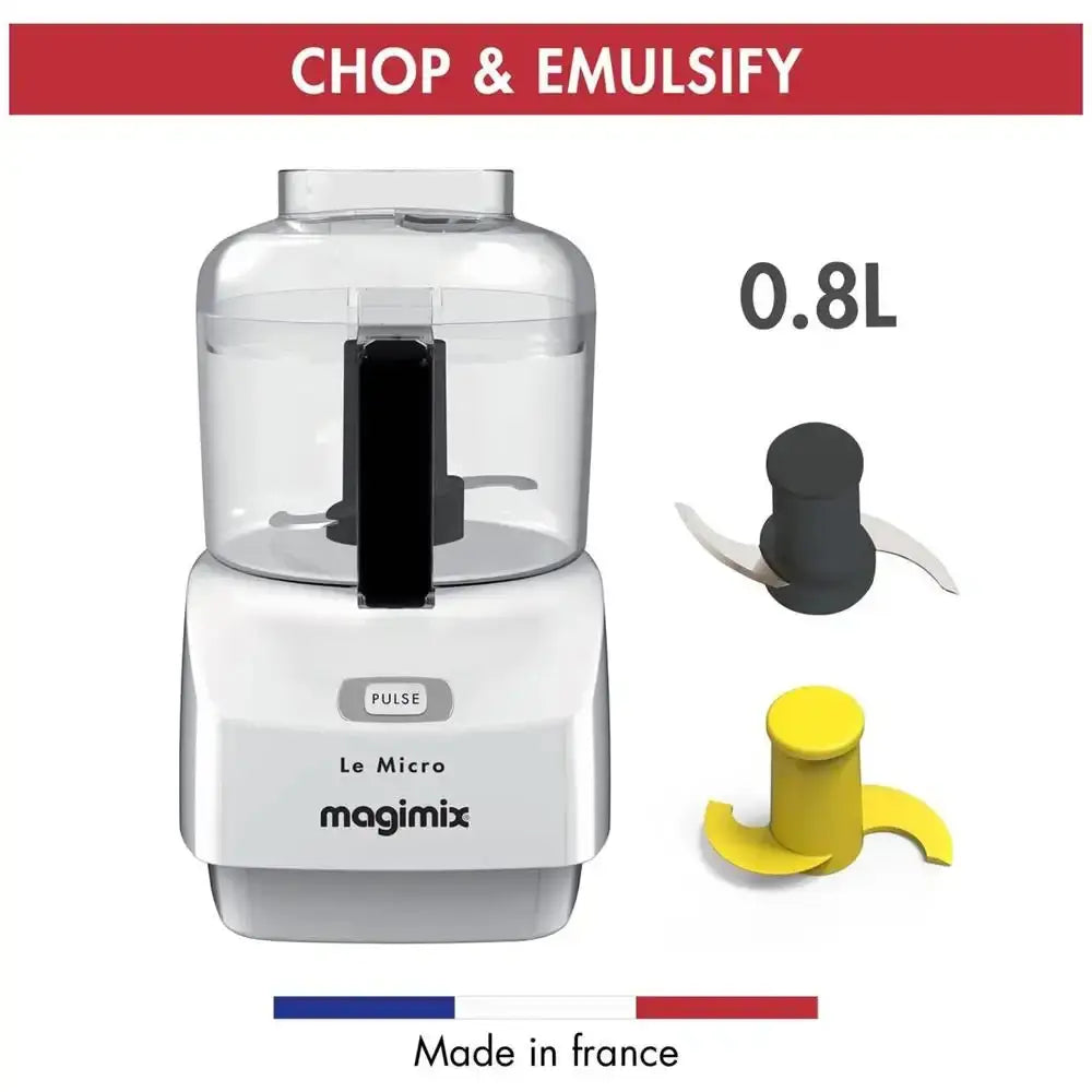 Magimix food processor with attachments on a white background