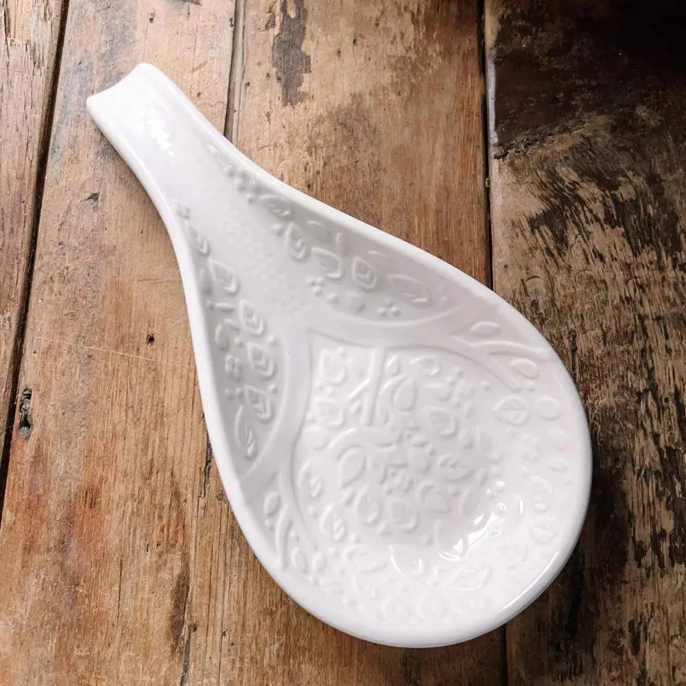 White ceramic mason cash in the forest spoon rest with intricate embossed floral and scrollwork design