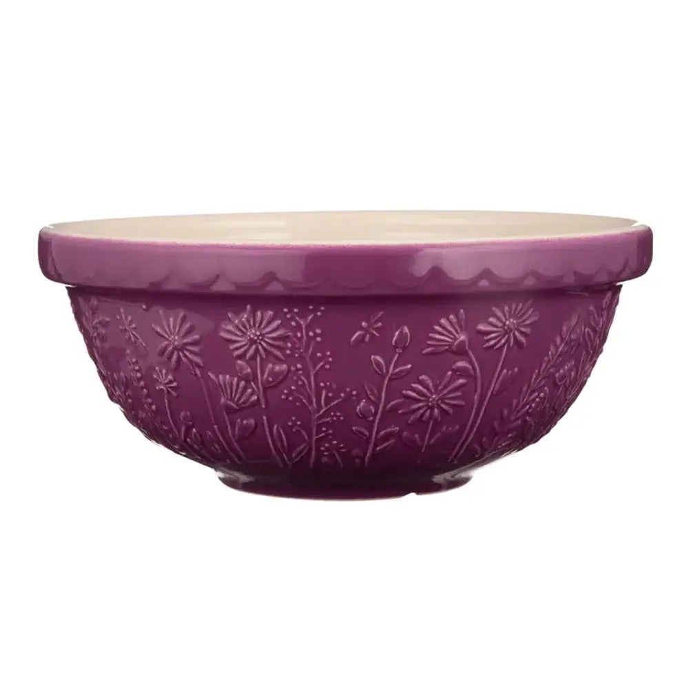 Purple ceramic bowl with decorative patterns on a white background