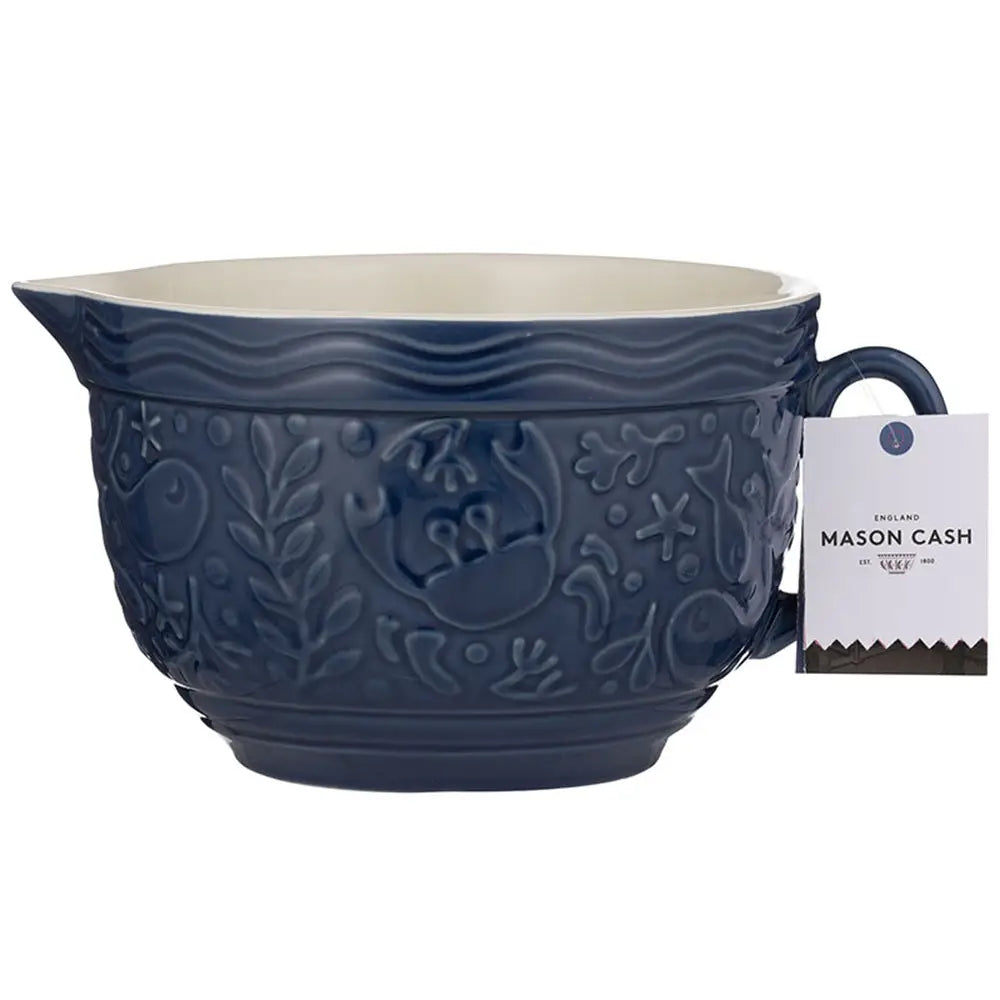 Blue embossed mixing bowl with a tag on a white background