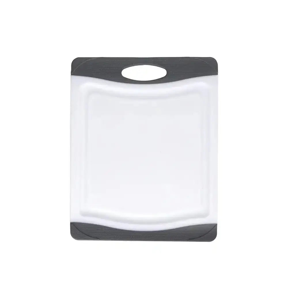 White cutting board with black edges on a white background