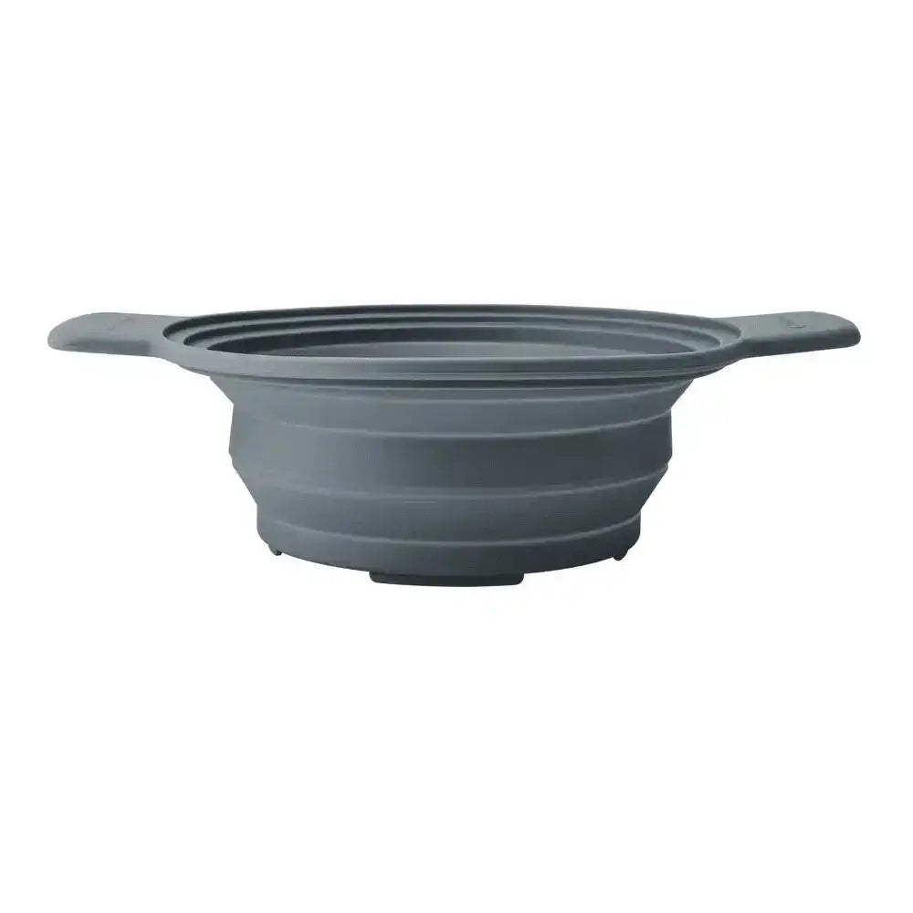 Collapsible gray silicone bowl on a white background