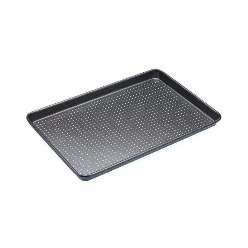 Perforated baking tray on a white background