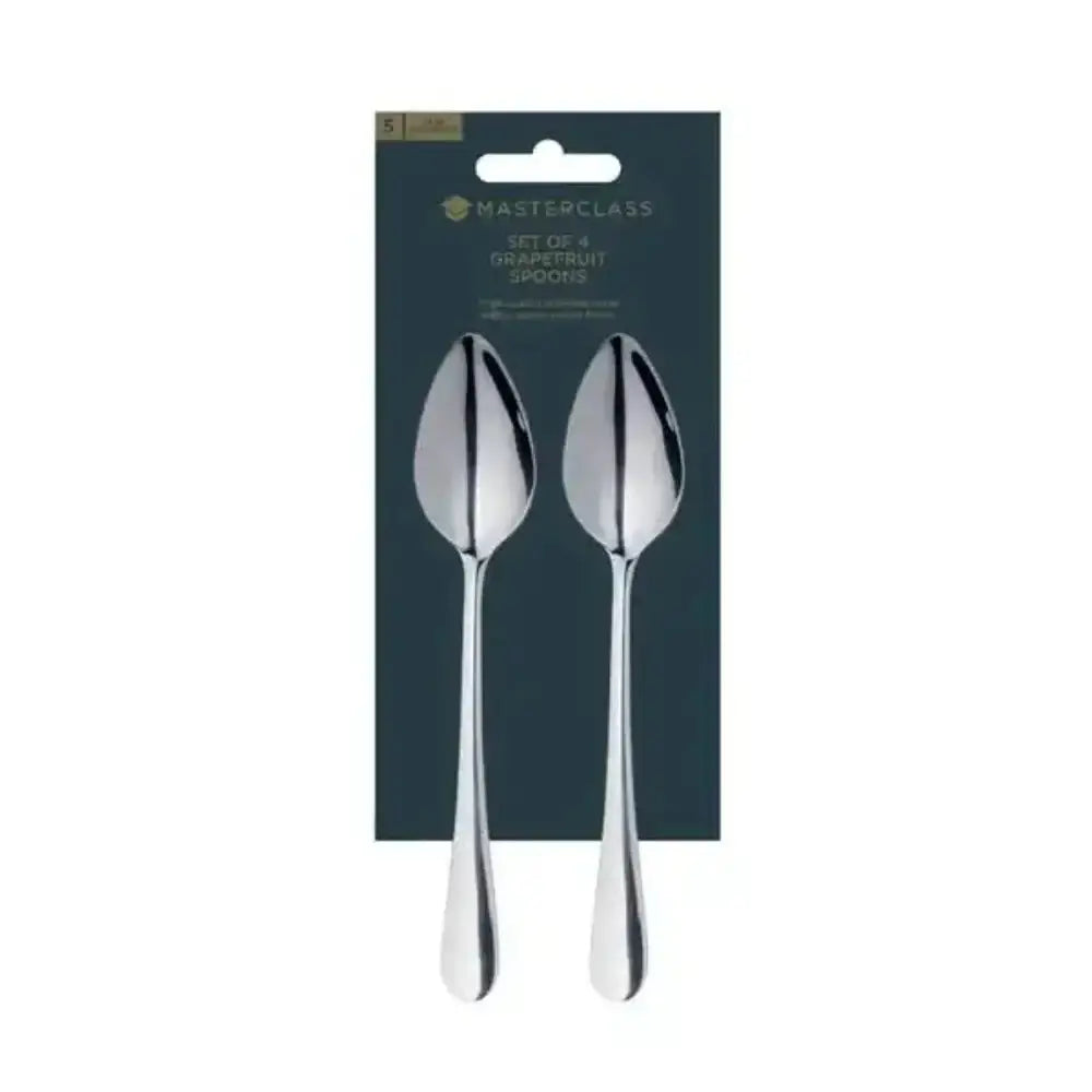 Set of two silver spoons in front of a Masterclass branded packaging on a white background
