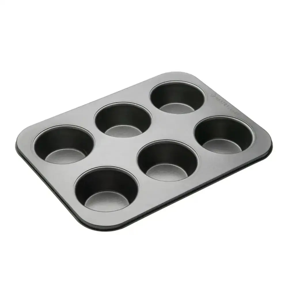Gray muffin tin with six compartments on a white background