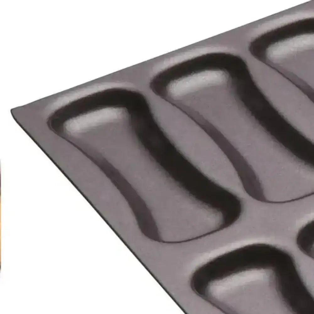 Gray metal baking tray with multiple compartments on a white background