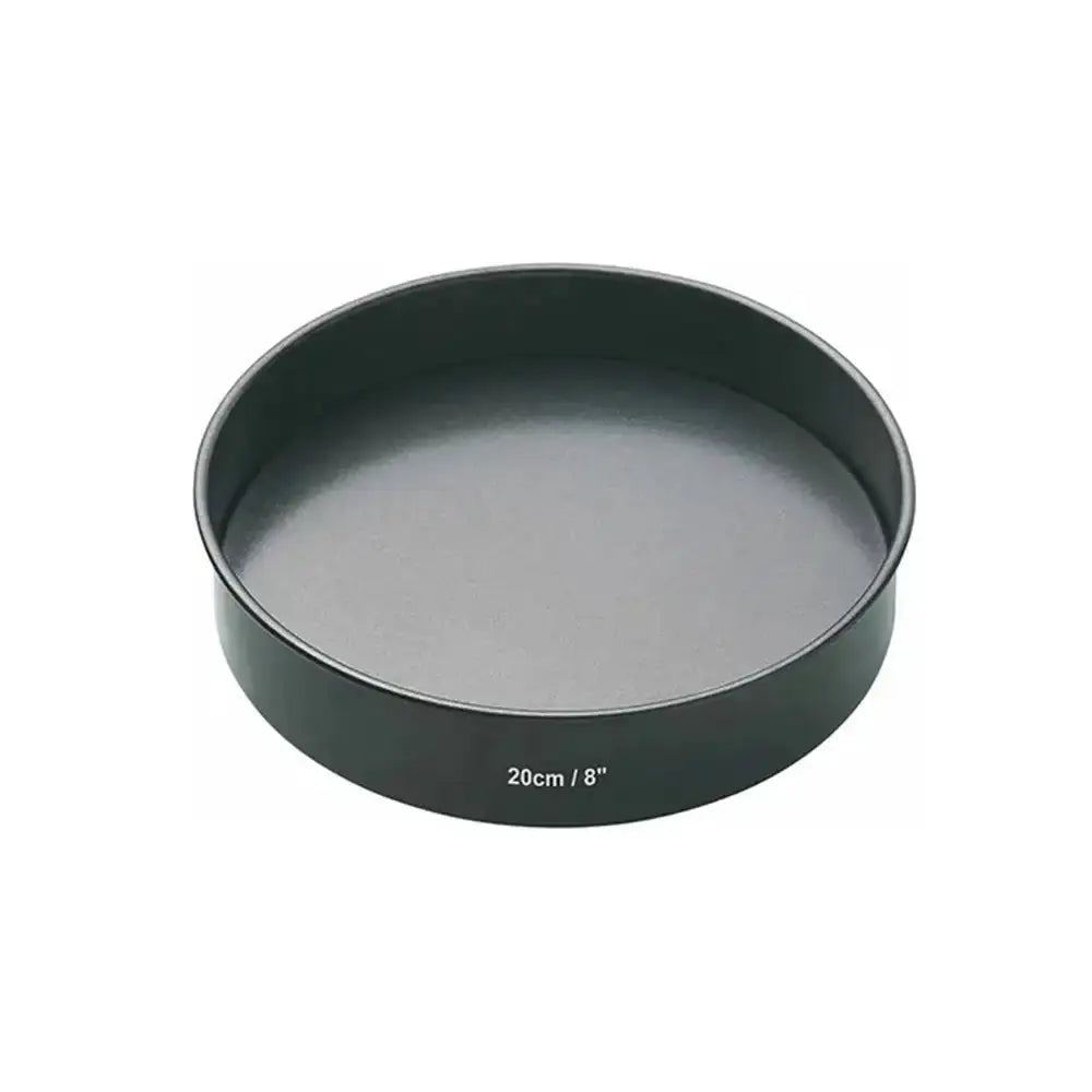 Black round cake pan with measurement label on a white background