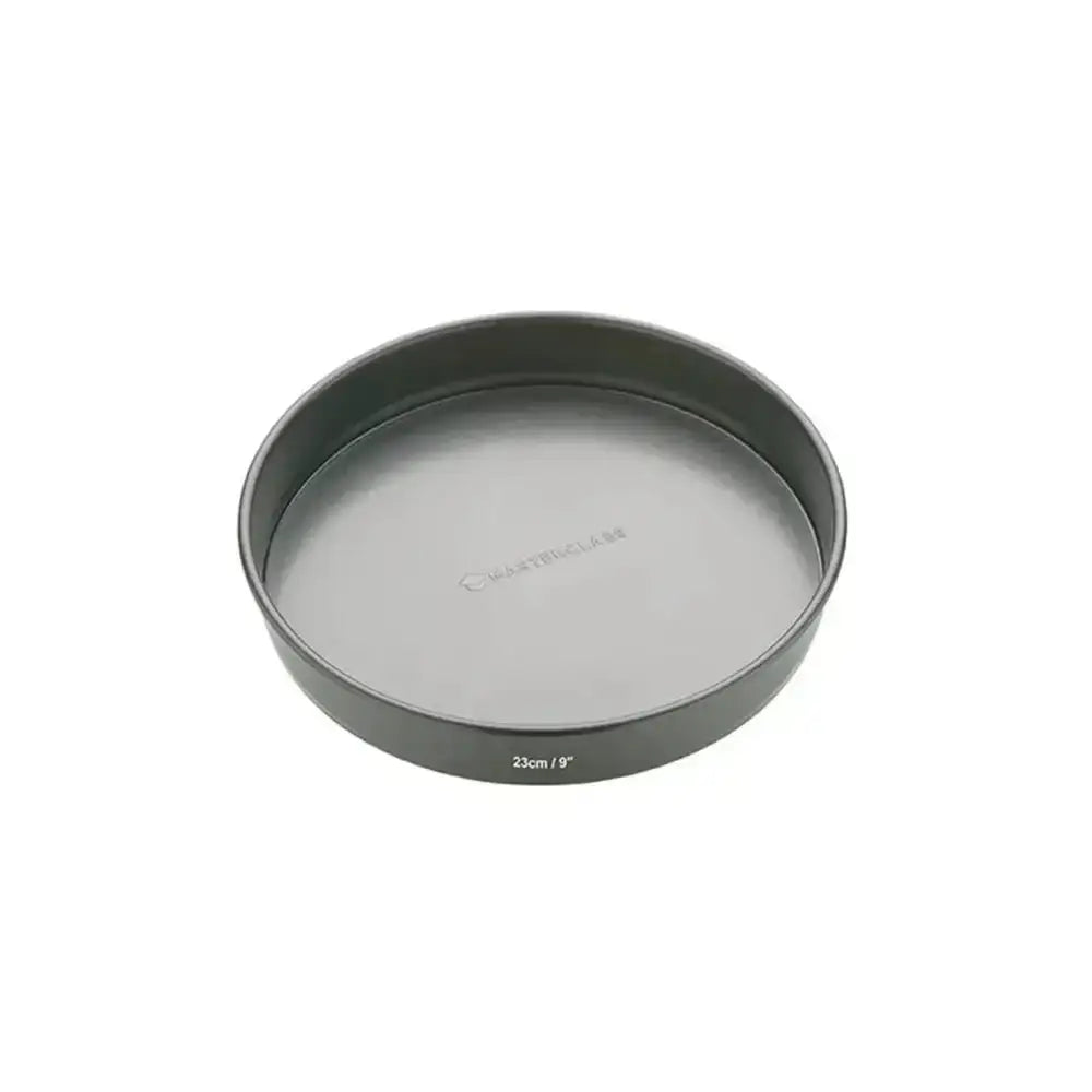 Round metal baking pan with MasterClass branding on a white background