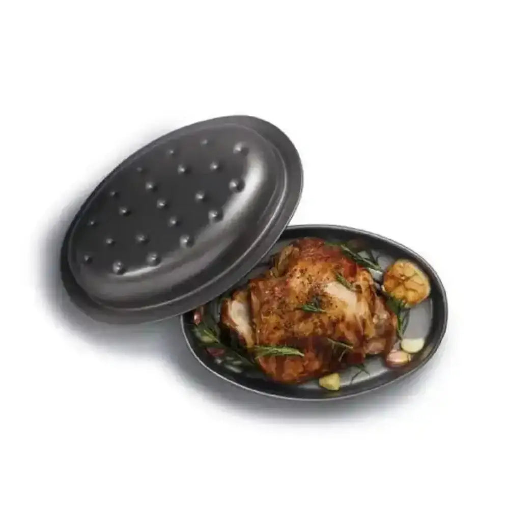 Roasted chicken on a plate with a perforated lid on a white background