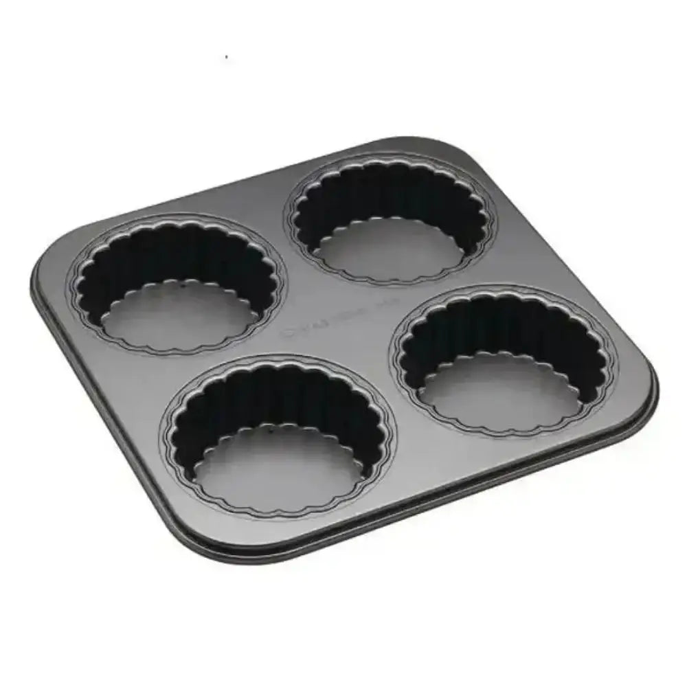 Four-cup fluted tart pan on a white background