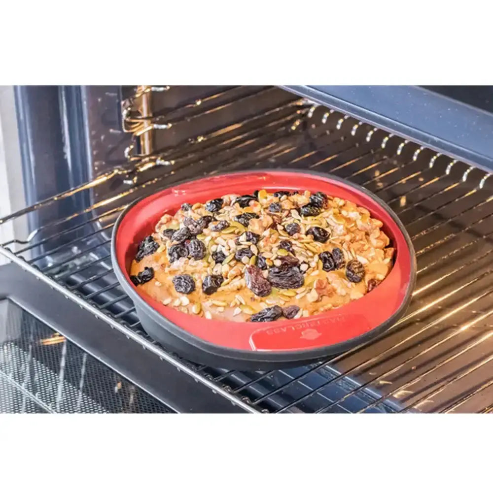 Silicone baking mat with a baked dish inside an oven