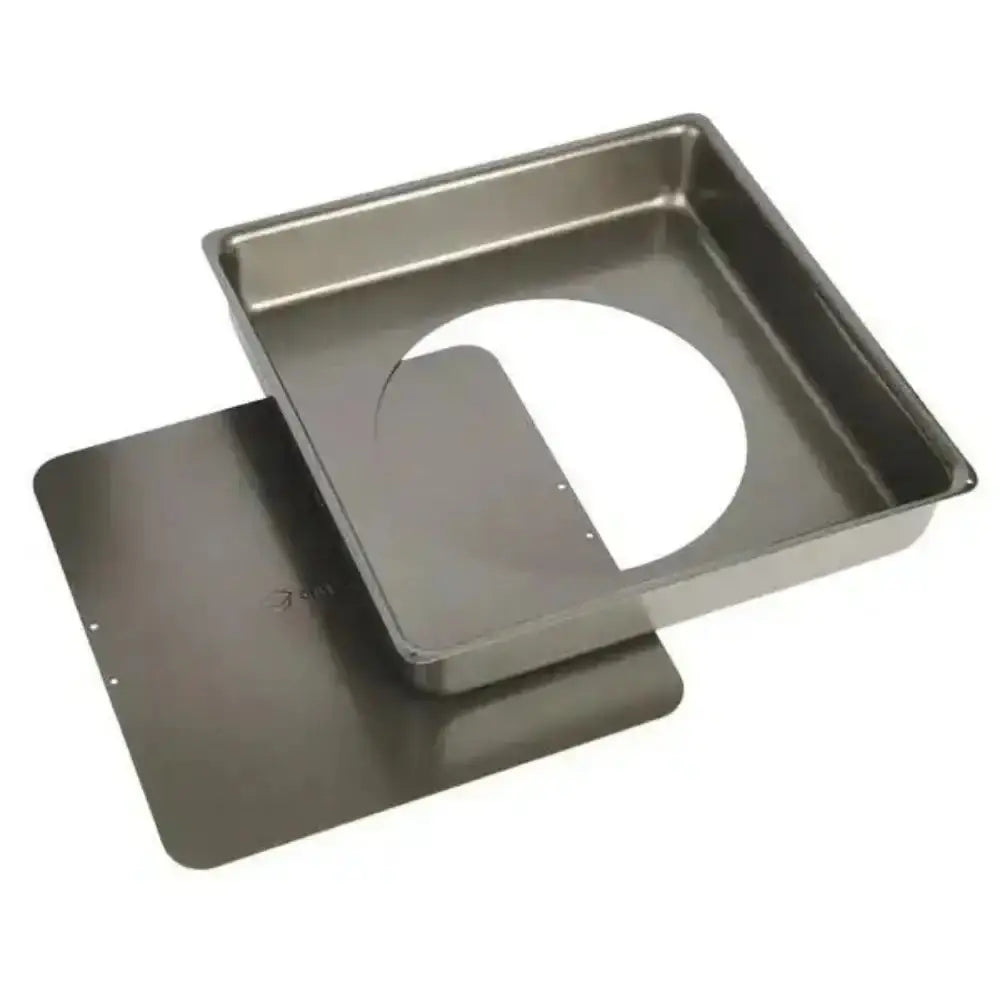 Metal baking tray with a circular cutout on a white background
