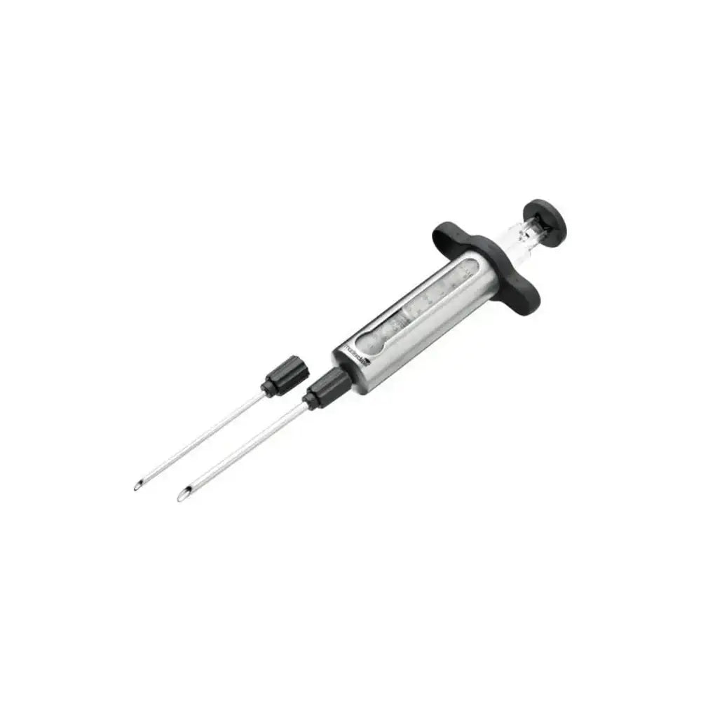 Metallic syringe with needle on a white background