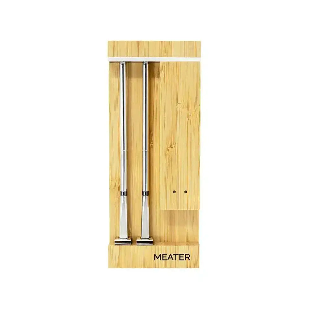 Two metal probes in a wooden packaging with 'MEATER' branding on a white background.