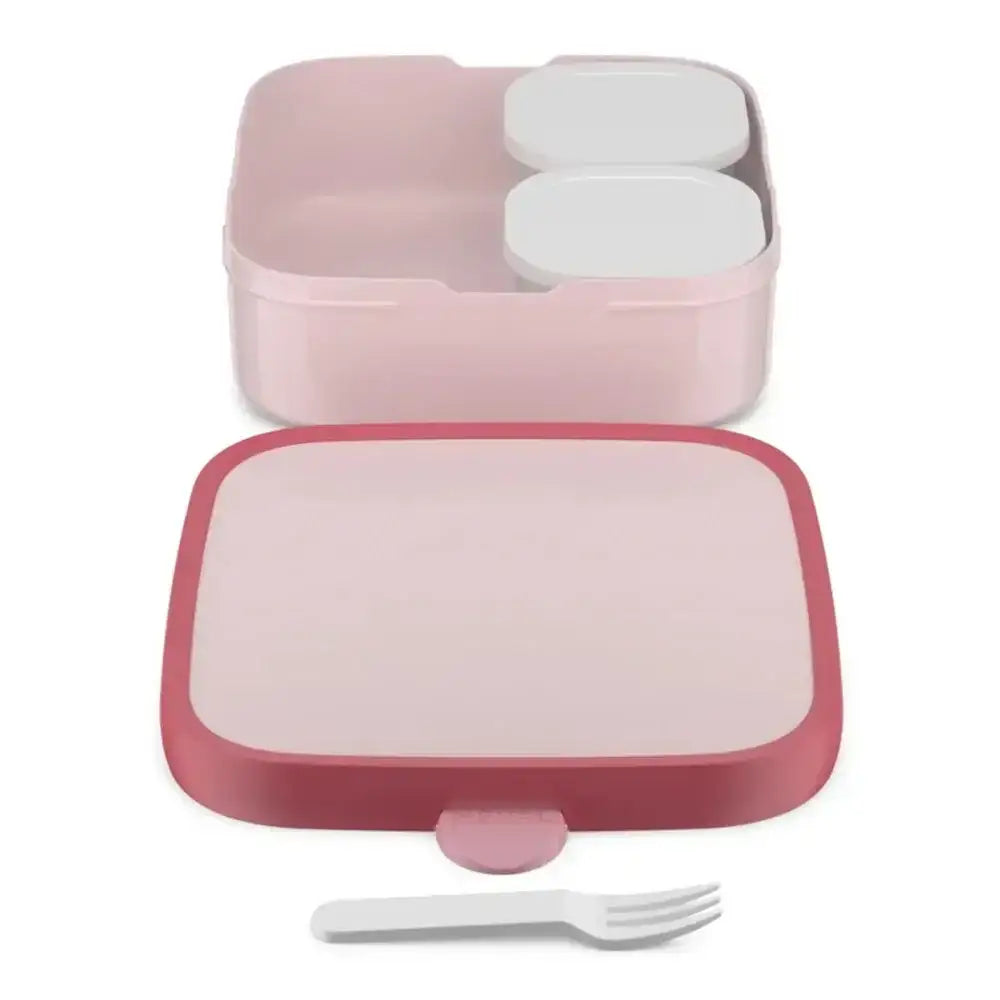 Pink and white bento box with a fork on a white background