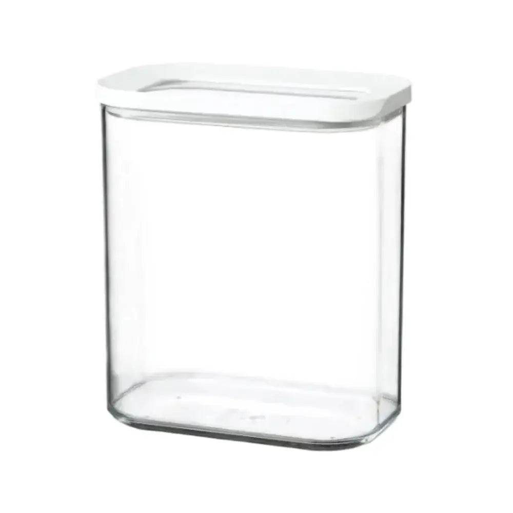 Clear glass storage container with a white lid on a white background