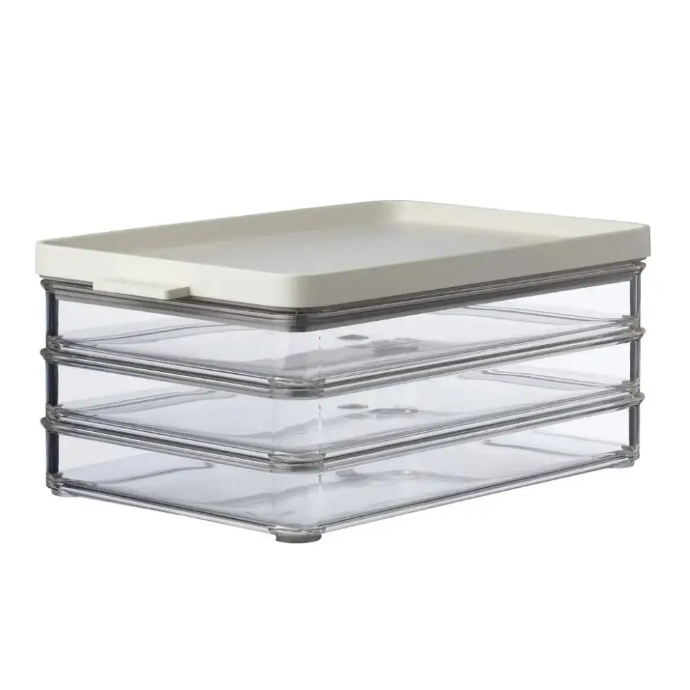 Clear plastic organizer with white lid on a white background