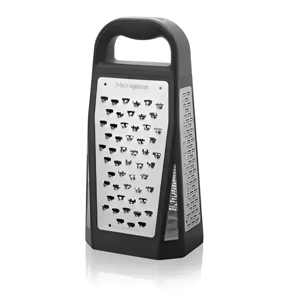 Box grater with metal surface and black handle on a white background