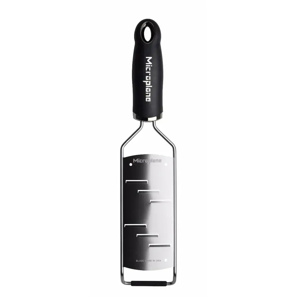 Microplane shaver on a white background.