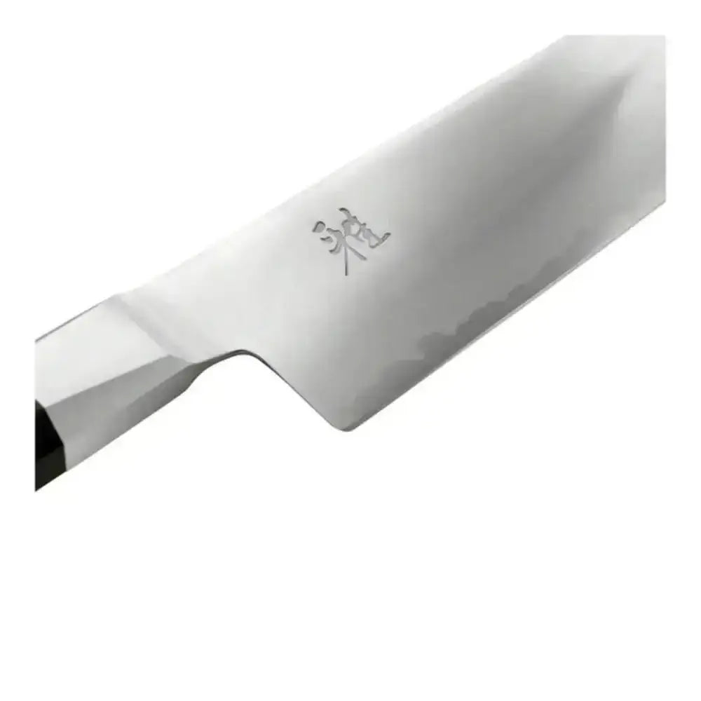 Stainless steel chef's knife on a white background