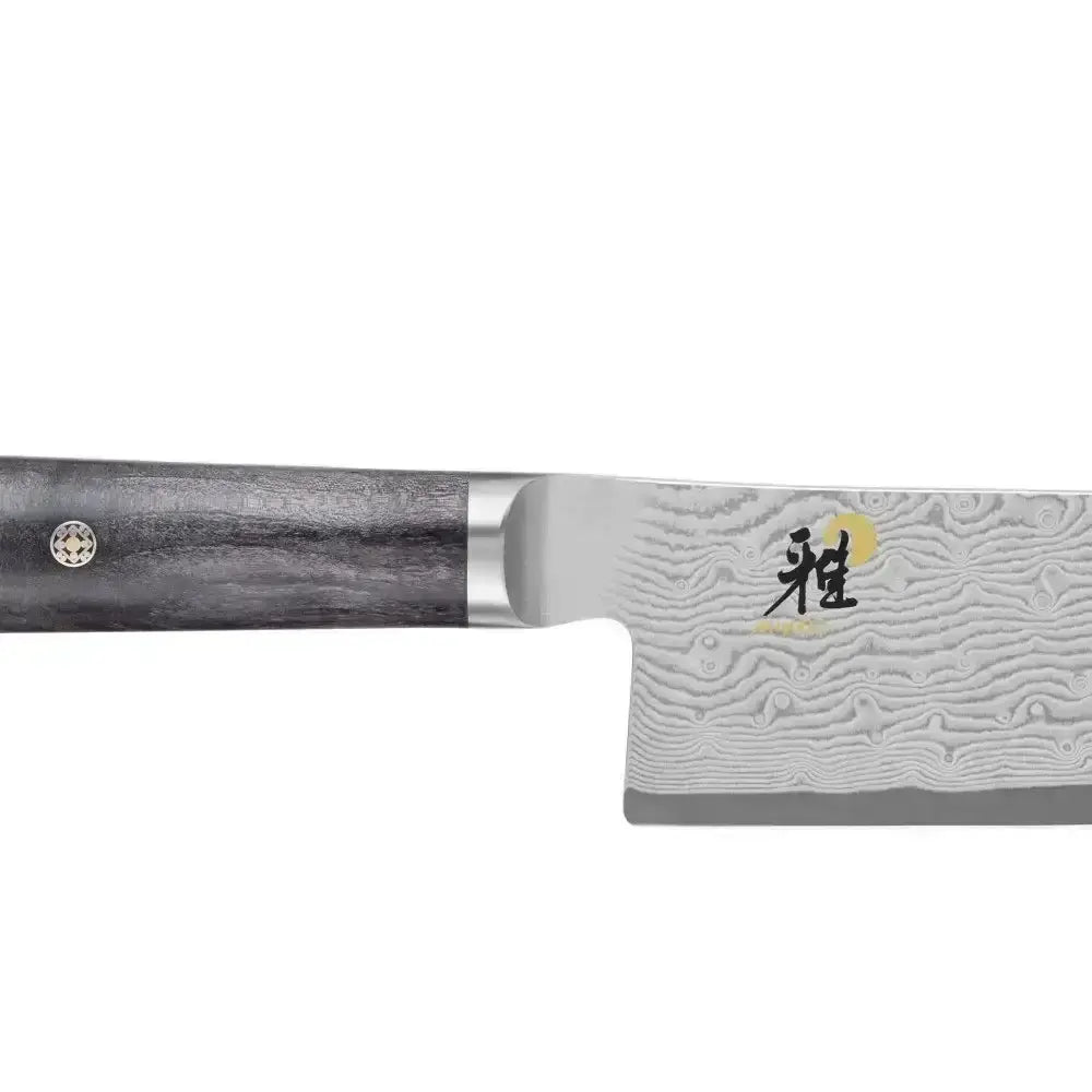 Textured knife with a wooden handle on a white background