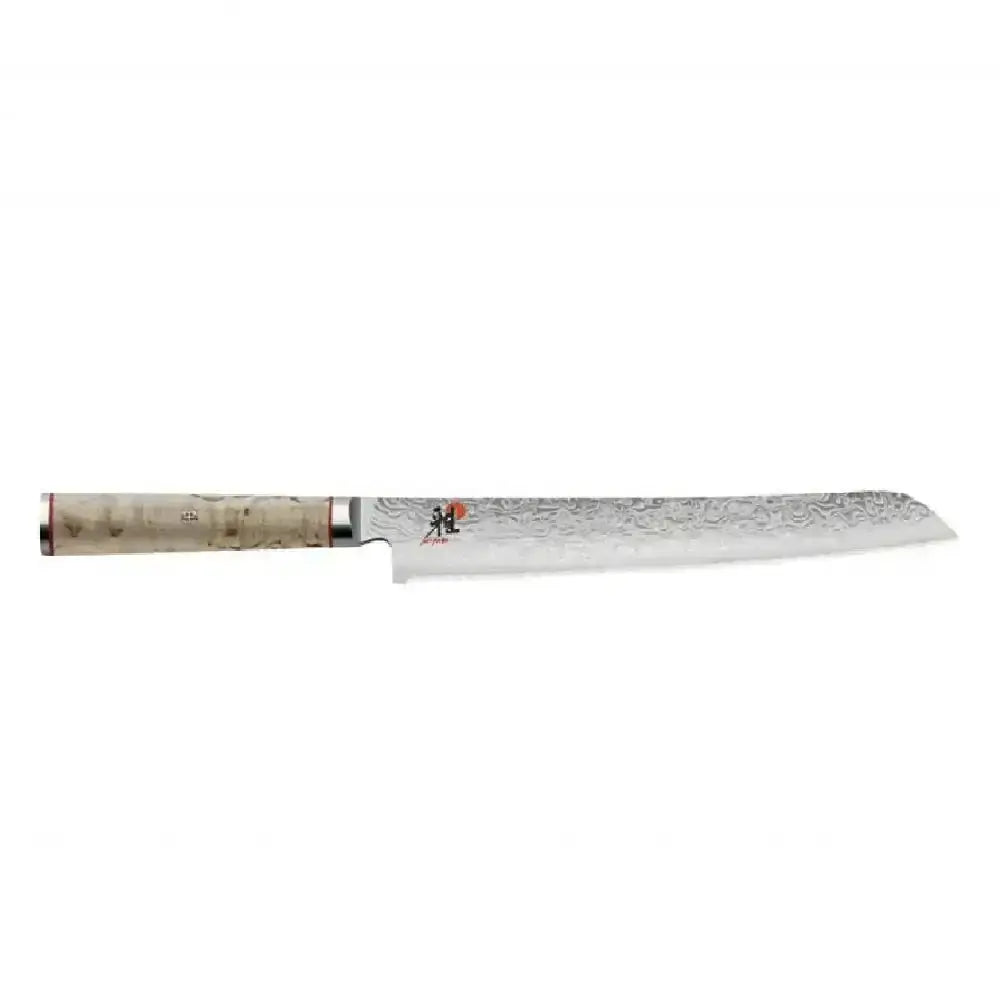 Serrated knife with a decorative handle on a white background